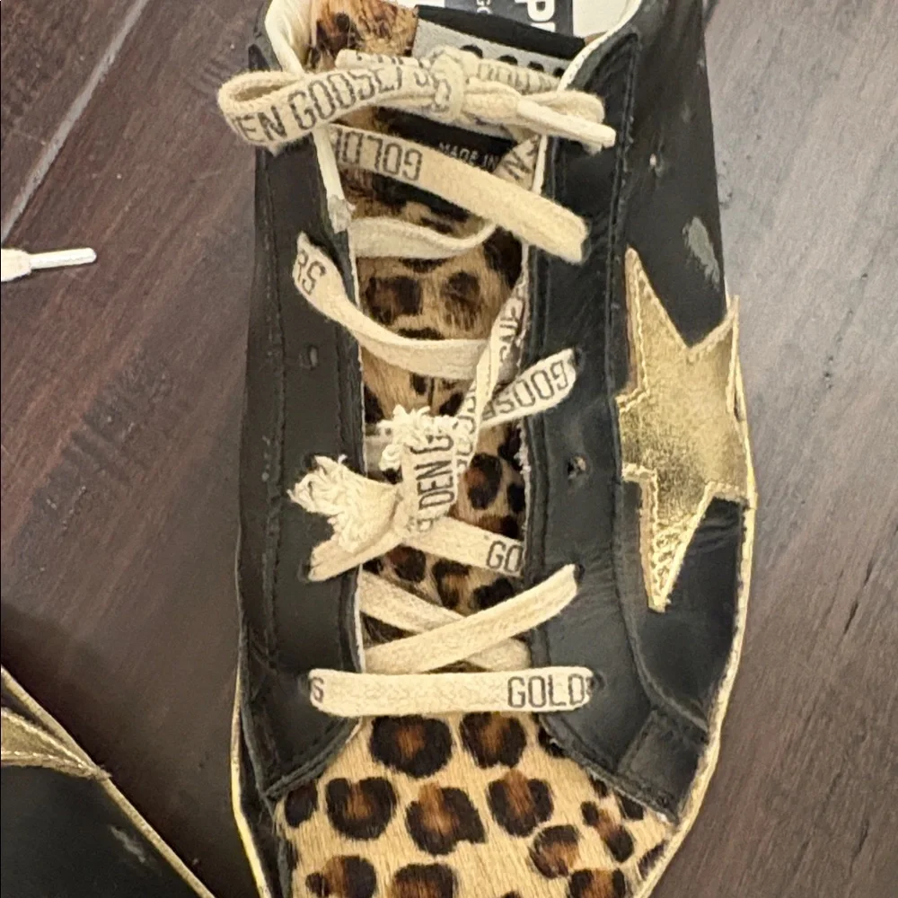 Golden Goose Superstar Black and Gold Sneakers with Leopard Print